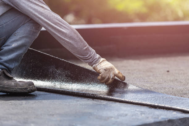 Professional Waterproofing technician working in Wolflake, IN